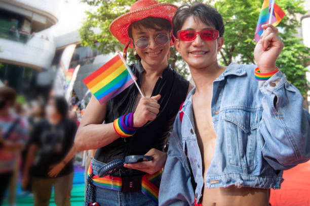 istock LGBTQ men have fun celebrating their pride with flags at the annual Pride Parade 2152275403