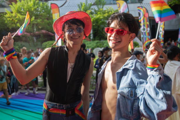 istock LGBTQ men have fun celebrating their pride with flags at the annual Pride Parade 2152275407