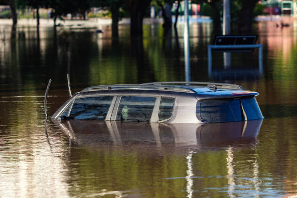 istock Car swept away by tragic flood 2152275859
