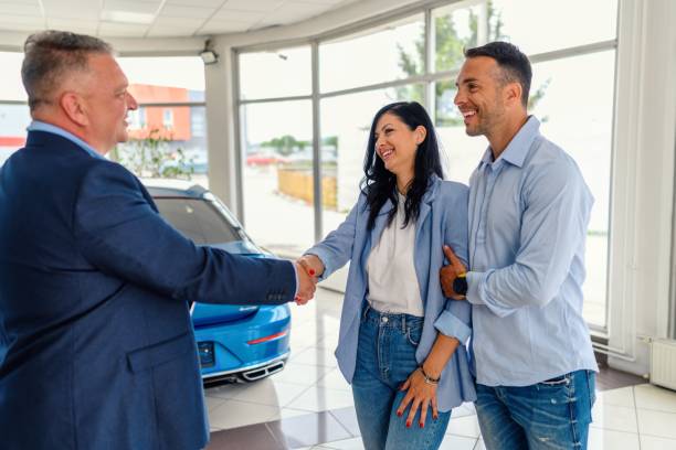 istock Successful deal in a car showroom! 2152281766
