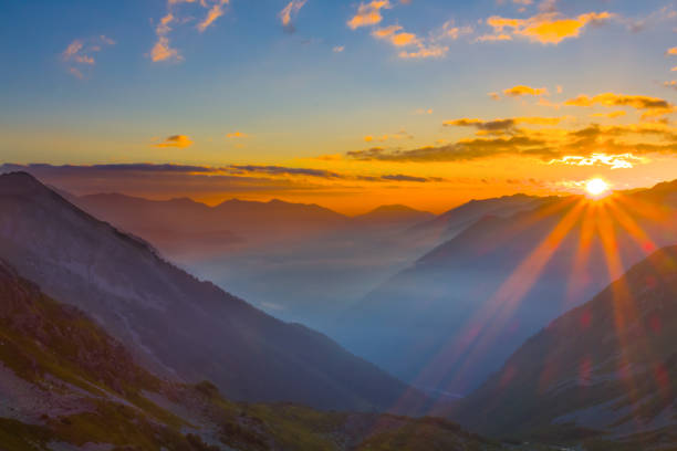 istock mountain valley silhouette in blue mist at the sunrise 2152282054