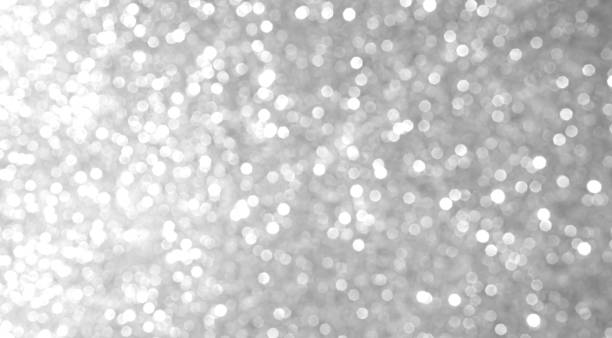 istock Grey Bokeh Background Circle Element Light Glow blur Sparkle Effect Silver Gray Shine Glamour Bright Wallpaper Summer Winter Decoration Festival Celebrate Defocused Greeting. 2152282675
