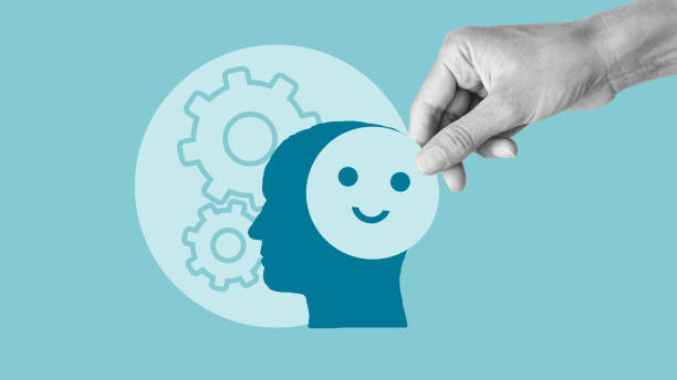 istock Positive behaviorism concept. Boosting productivity abilities, business motivation Sign. Enterprise impetus. Hand holding happy smile inside human brain 2152283096