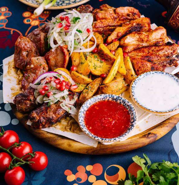 istock Traditional georgian feast with assorted grilled meats 2152283403