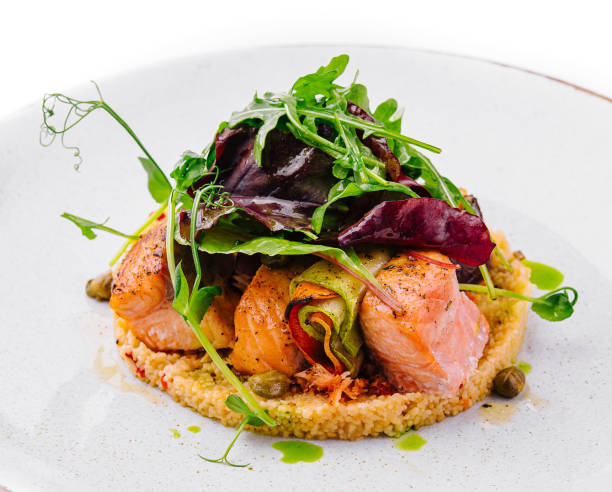 istock Gourmet salmon dish on white background 2152285102