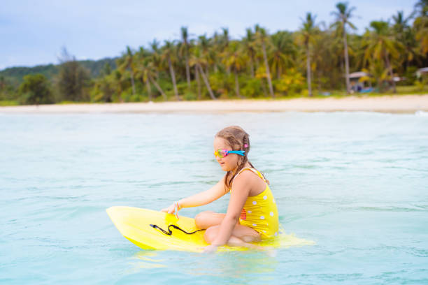 istock Kids playing on beach. Children play at sea. 2152287063