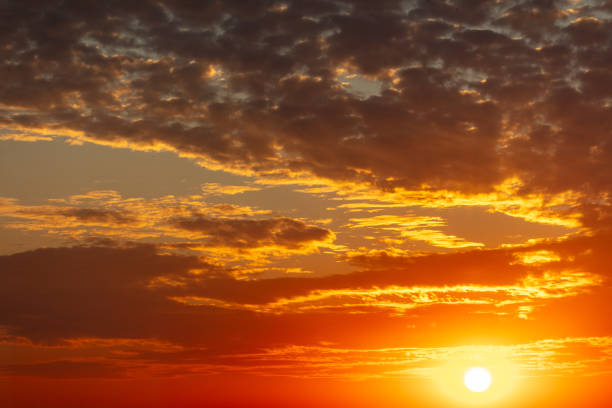 istock Golden sunset on the sky with clouds 2152288920
