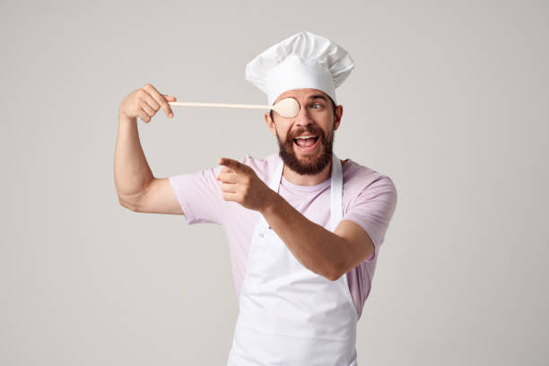 istock chef in uniform restaurant gourmet professional service 2152290940