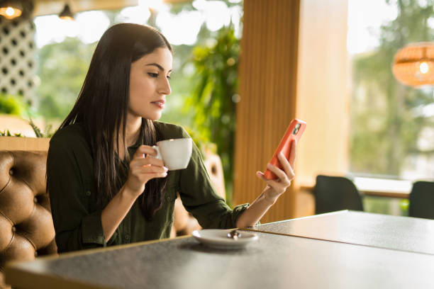 istock Woman having a coffee break at cafe. 2152293647