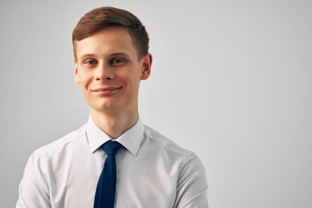 istock handsome man in shirt with tie posing office manager 2152294954