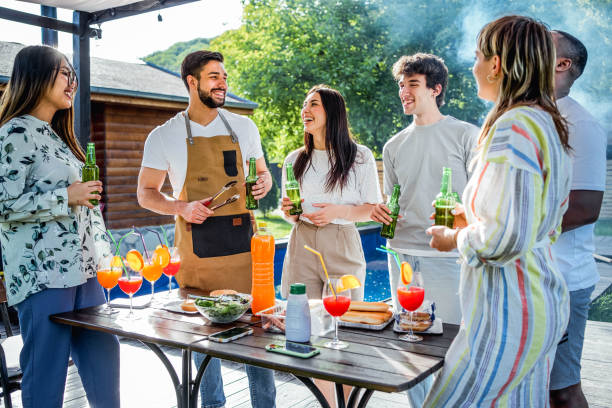istock Friends having a backyard poolside barbecue party 2152295631