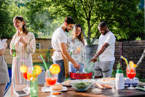 istock Young people having fun at a barbecue party 2152296692