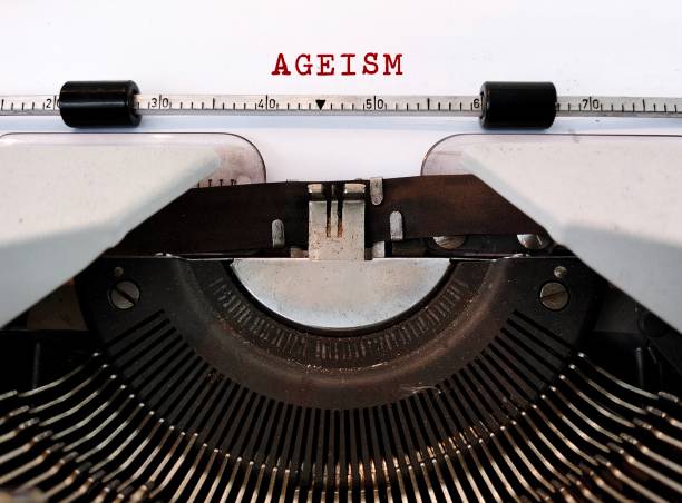 istock Vintage typewriter with typed text AGEISM, bias against discrimination or bullying on elderly against their age 2152302271
