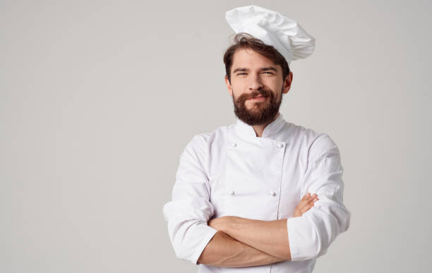 istock male chef uniform headdress light background cropped view 2152302767