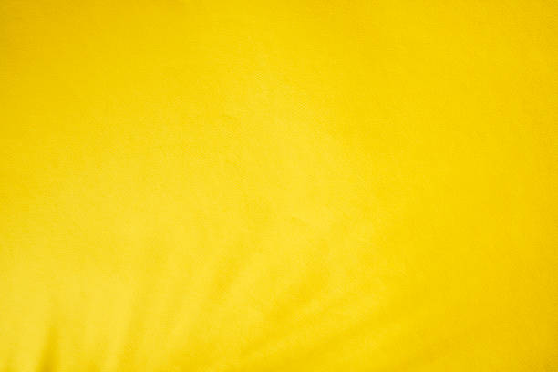 Yellow background cloth fabric orange color gradient texture pattern silk wave banner gold, fashion material backdrop poster for summer tropical travel holidays, satin mockup luxury premium.