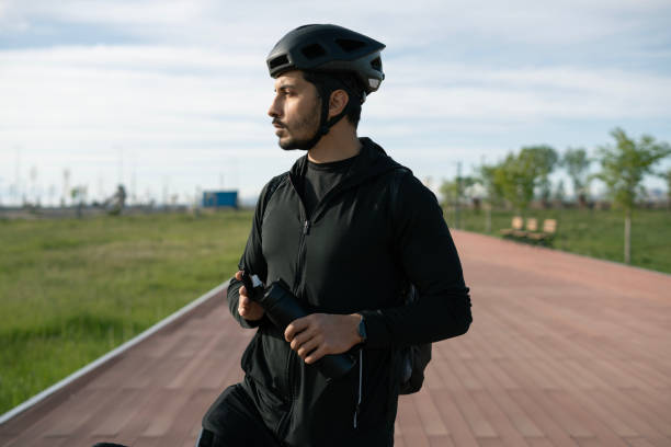 Portrait of brunette cyclist with helmet