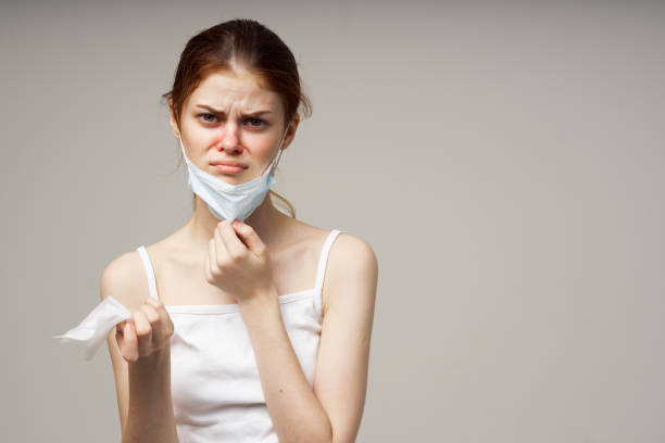 istock woman medical mask handkerchief cold health problem 2152306987