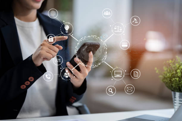 istock Copyright or patent concept, Person hand using laptop computer, tablet and smartphone with virtual screen copyright icon trademark, Creation ownership against piracy at office. 2152307045