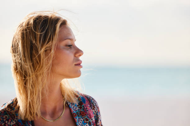 istock Profile view of beautiful blond woman in summer. 2152307698