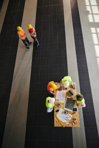 istock Above view of construction team working in the building. 2152309460