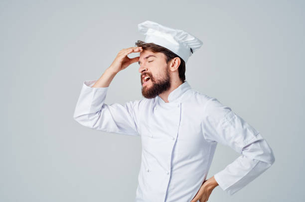 istock bearded man restaurant service Professional light background 2152313252