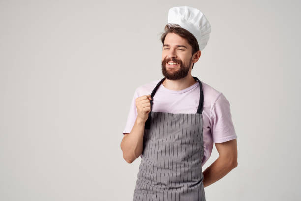 istock a man in a chef's hat emotions of professionals work in a restaurant 2152313901