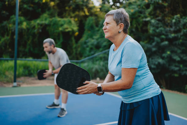 istock Senior couple playing pickleball 2152316589