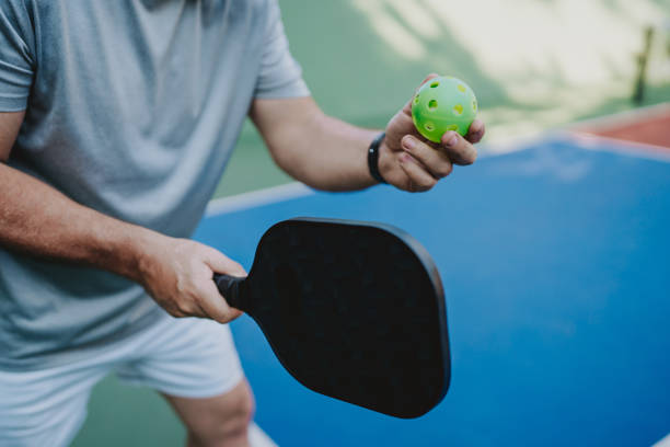 istock Unrecognizable person serving at pickleball 2152316591