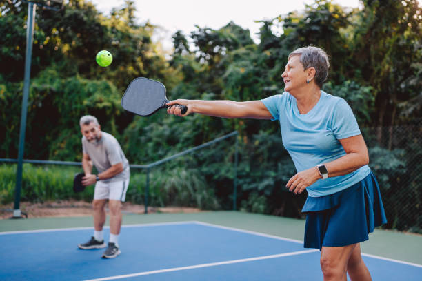 istock Senior couple playing pickleball 2152316594
