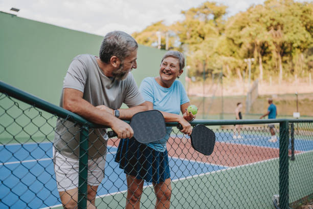 istock Senior couple take break from pickleball game 2152316700