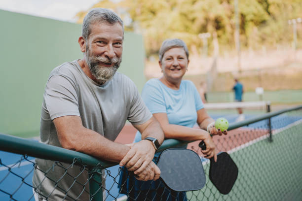 istock Senior couple take break from pickleball game 2152316705