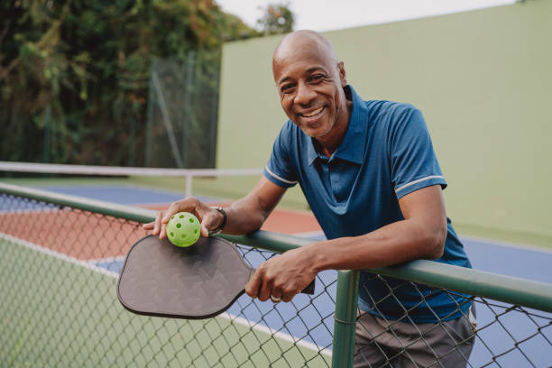 istock Portrait mature man pauses pickleball game 2152316916
