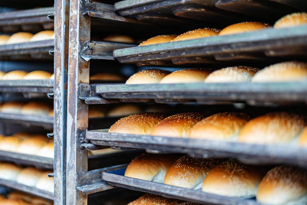 istock Bread just baked in bakery on the shelves. 2152317170