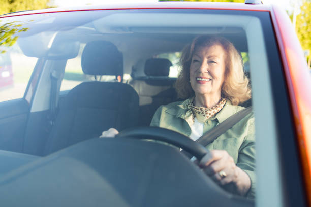 istock Senior woman enjoying driving 2152317383