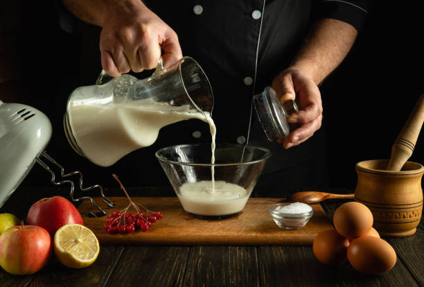 istock The chef prepares a delicious breakfast or lunch with eggs and milk. Menu idea for a restaurant or hotel. Dairy diet concept 2152318625