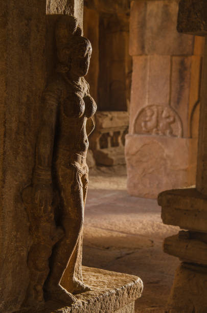 Close-up of intricate stone carvings on the wall of Pre Rup Temple in Angkor, revealing detailed decorative patterns in the historic Khmer architectural style.
