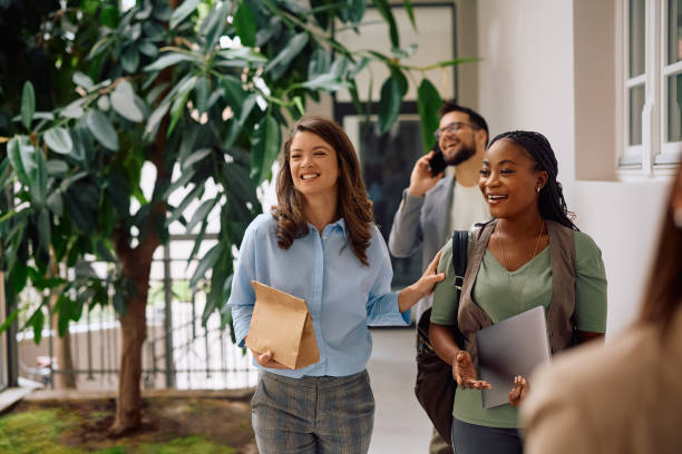 istock Happy start up team having fun while going on lunch break in the office. 2152322054