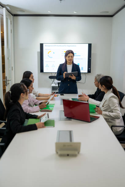 istock Diverse Modern Office: Businessman Leads Business Meeting with Managers, Talks 2152326431