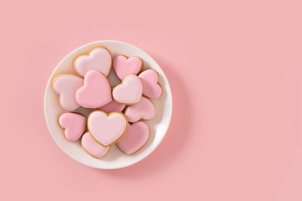 istock Valentine's Day heart shaped pink glazed cookies. 2152335057