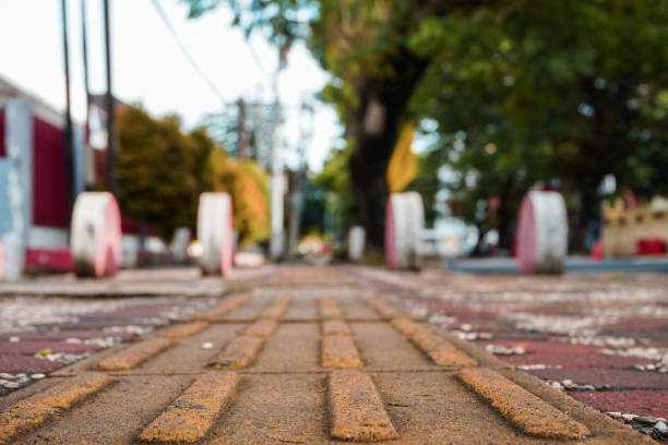 istock a pedestrian path, vehicle obstacles, and a blind man's path a pedestrian route with vehicle obstructions and a blind man's route 2152341678