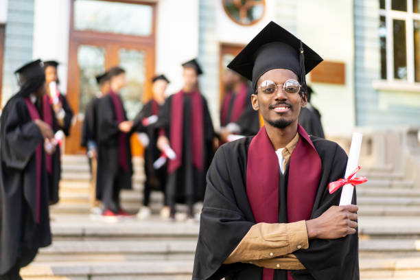 istock An alumnus holding his degree 2152341922