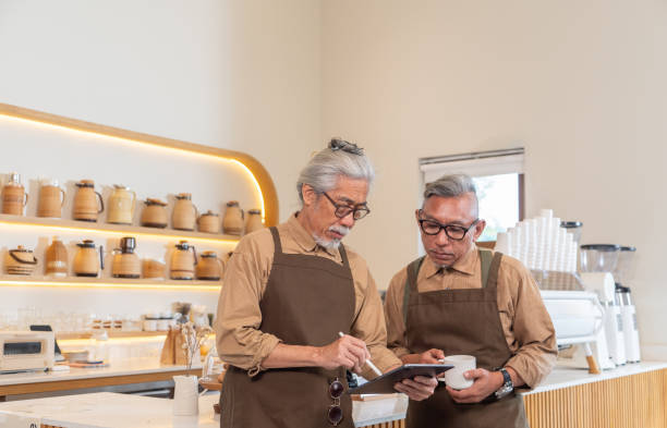 istock Senior men working and planning business model 2152342342