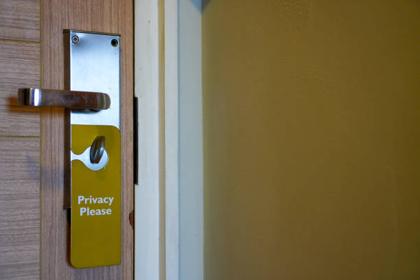 istock Hotel private please tag hanging on a doorknob with copy space 2152343771