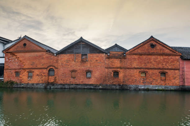 On a sunny day in April 2024, the Tokachi Memuro Red Brick Warehouse stands near JR Memuro Station in Memuro Town, Kasai County, Hokkaido, Tokachi Region.