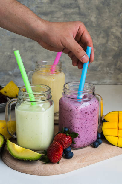 istock Colorful smoothie with avocado, pineapple, mango, strawberries, blueberries 2152357008