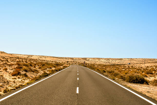 istock A long road with no cars on it 2152358954
