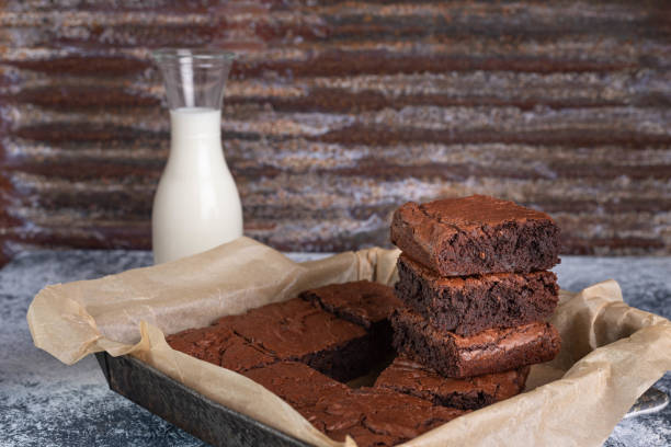 istock Dark chocolate espresso brownies, white and gray textured background. 2152360805