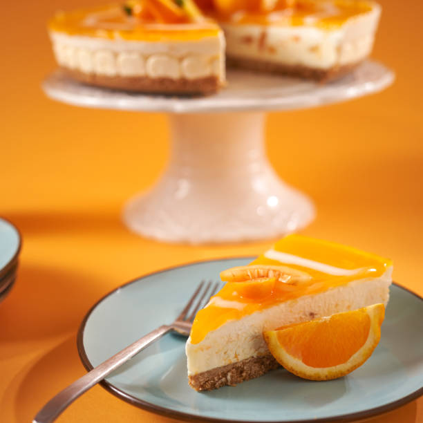 istock Creamy Orange Cheesecake with Whipped Cream 2152369414