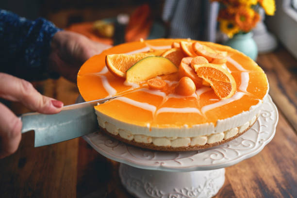 istock Creamy Orange Cheesecake with Whipped Cream 2152369424