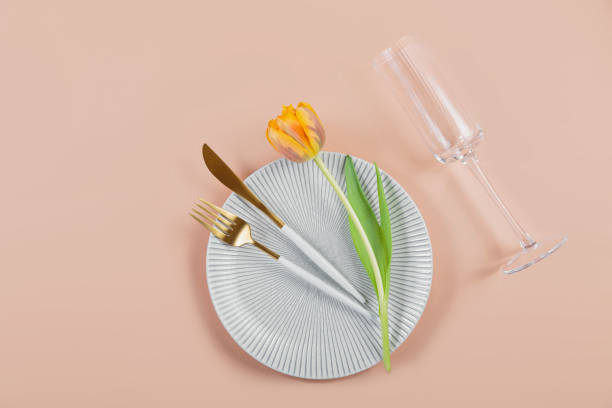 istock Spring-Themed Table with Tulips and Cutlery 2152369693